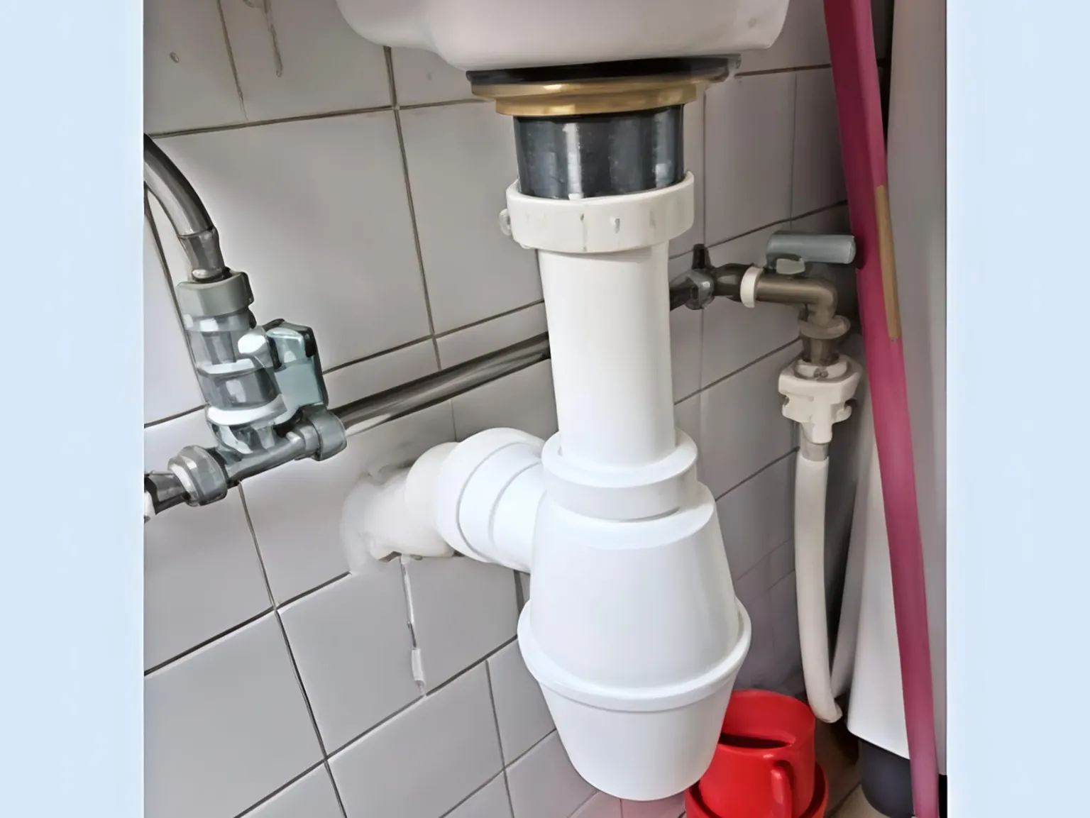 bottle-trap-waste-pipe-replacement-singapore.webp Bottle trap and waste pipe replacement under a sink